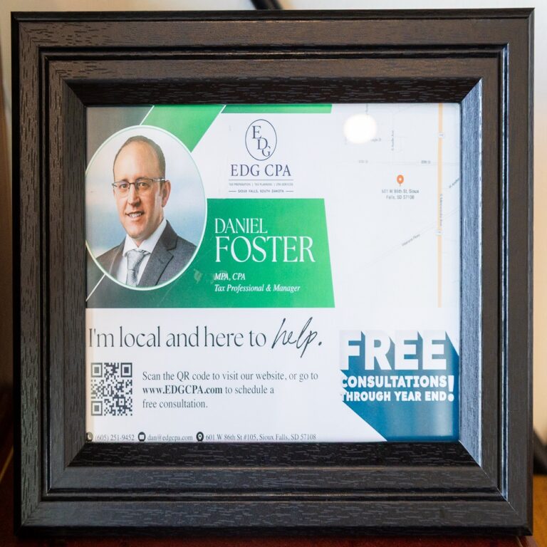 Daniel Foster, CPA, of EDG CPA in Sioux Falls, SD, featured on a promotional display offering free consultations
